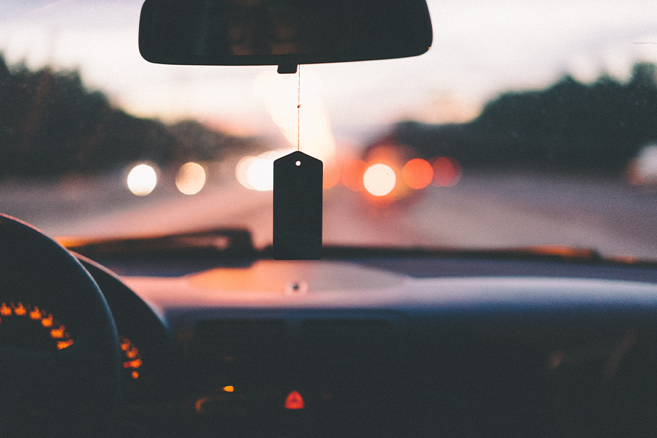 View of sunset from inside a car